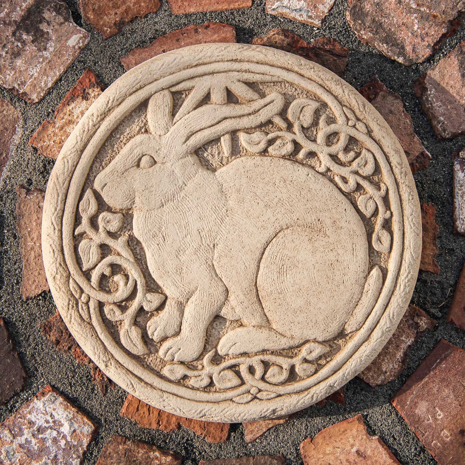 Handcrafted round stone rabbit plaque with Celtic knotwork border by Carruth Studio